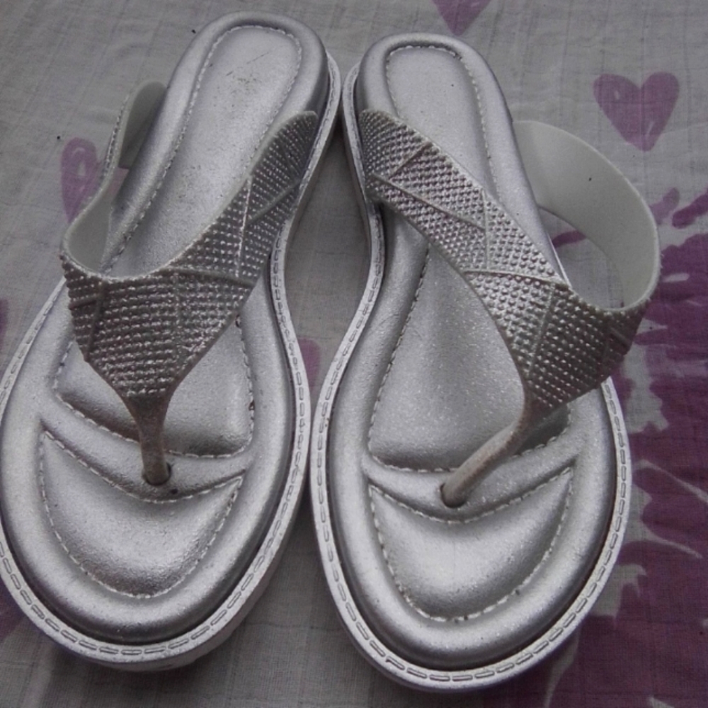 Silver flip-flop shoes